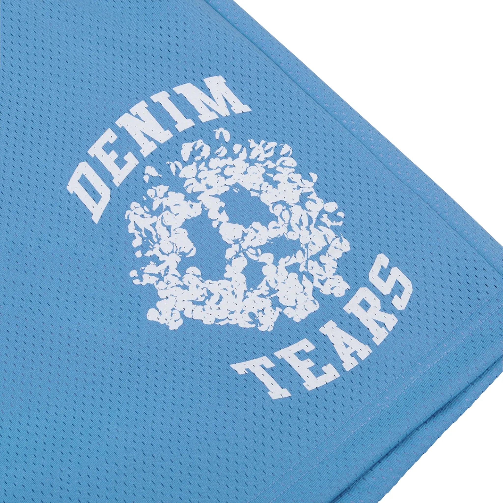 Detailde Logo view of denim tears university light blue mesh shorts